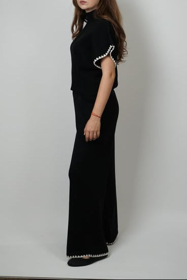 Triko işlemeli takım